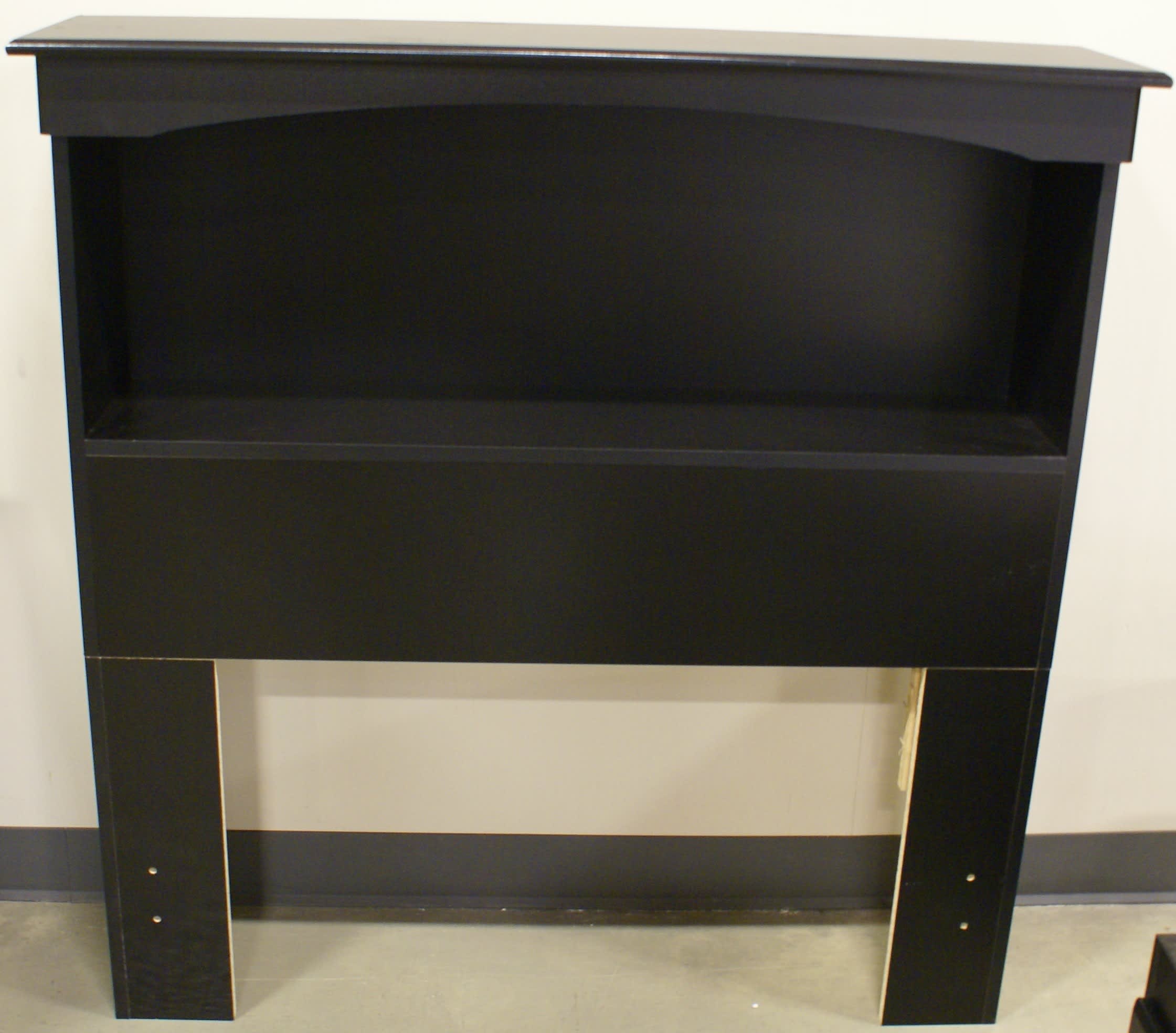 The central compartment has an adjustable shelf. perdue 5031b black twin bookcase headboard